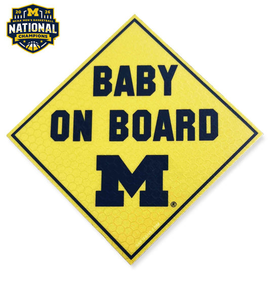 Baby on board sign with Michigan Wolverines logo and NCAA basketball champions